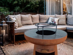 Barbecue rond avec plaque ronde en acier et grille en acier corten -