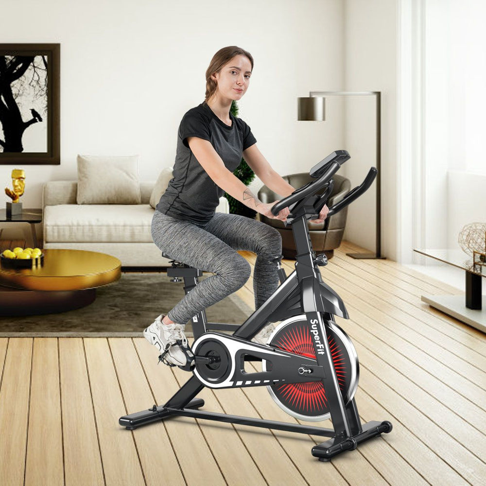 Vélo d’appartement silencieux avec roue et guidon en acier -